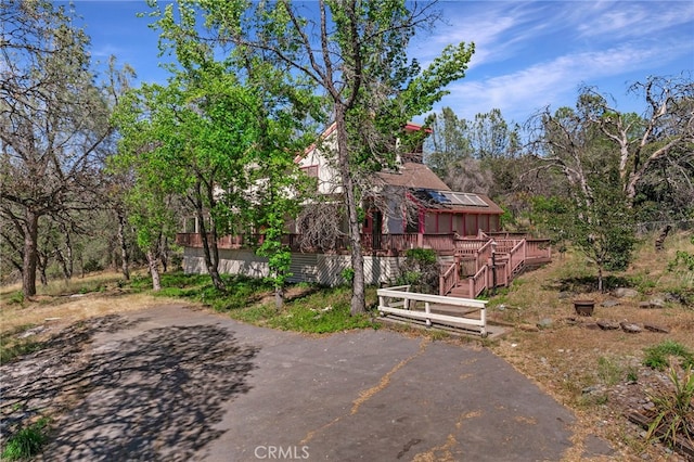 view of front of house with a wooden deck