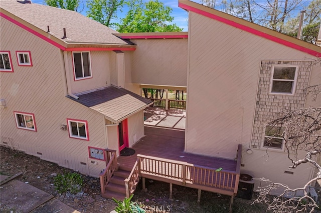 rear view of property with a deck