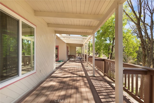 wooden deck featuring a pergola