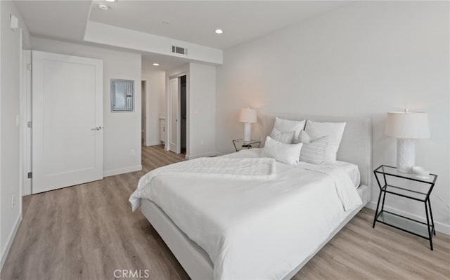 bedroom with light wood-type flooring