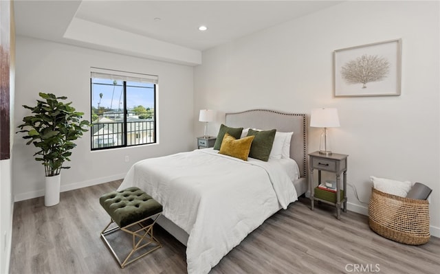 bedroom featuring hardwood / wood-style floors