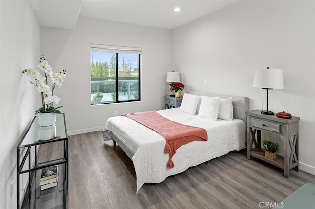 bedroom featuring hardwood / wood-style flooring