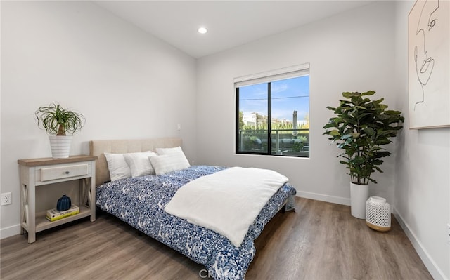 bedroom featuring hardwood / wood-style floors