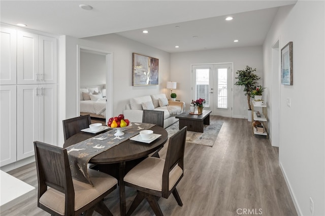 dining area with light hardwood / wood-style flooring