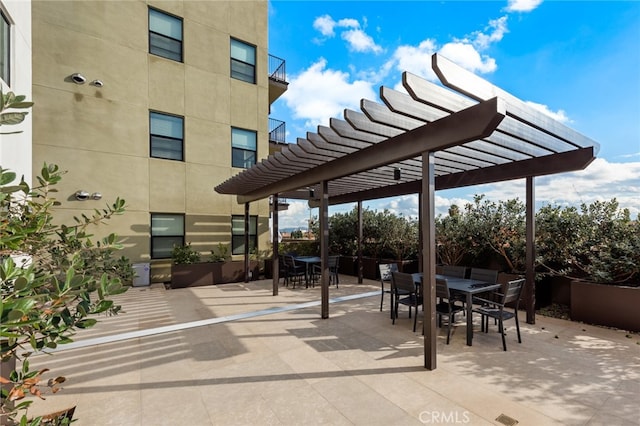 view of terrace with a pergola