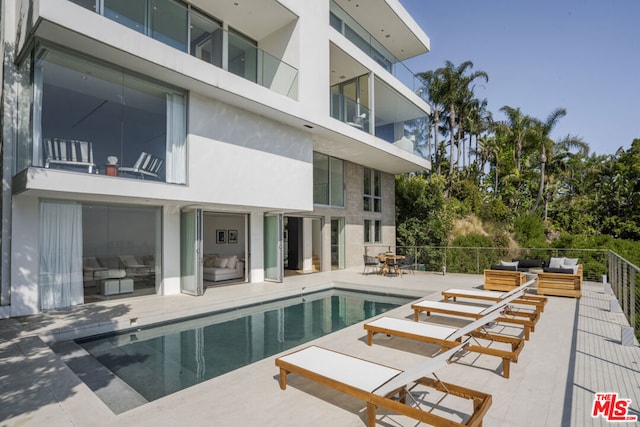 view of pool featuring an outdoor living space