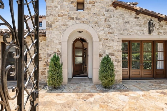 view of exterior entry with french doors