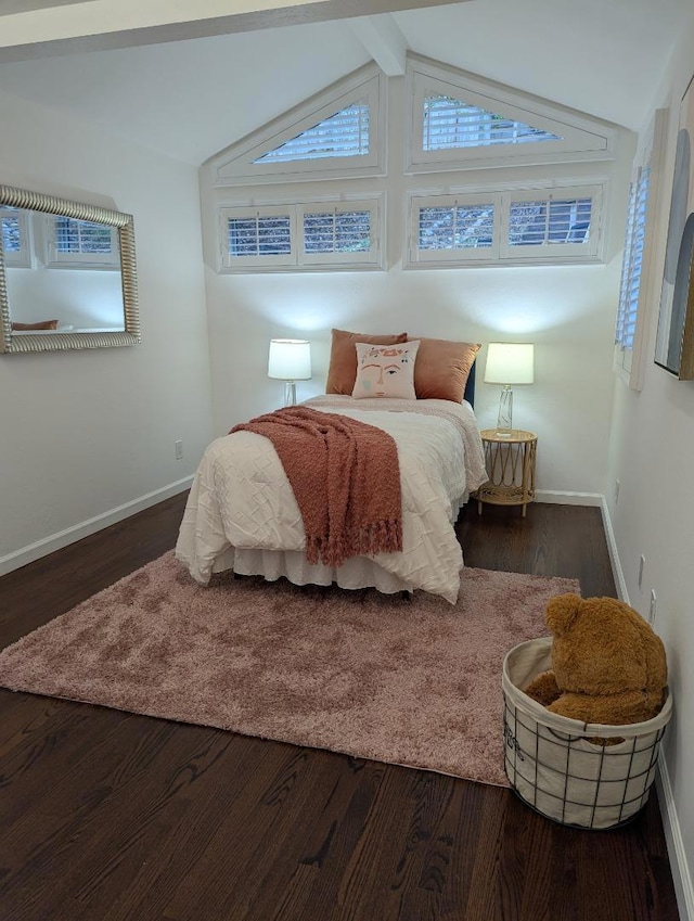 bedroom with vaulted ceiling with beams and dark hardwood / wood-style flooring