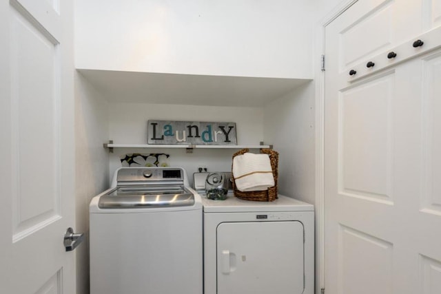 laundry area featuring independent washer and dryer