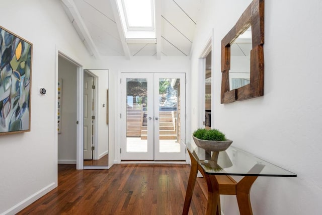 doorway featuring french doors, dark wood-type flooring, and lofted ceiling with skylight