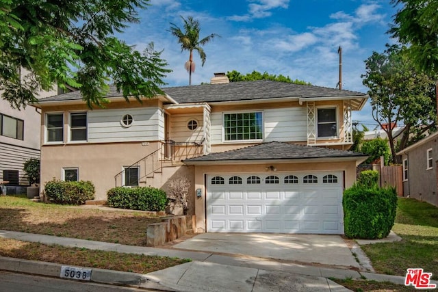 view of front of home featuring a garage