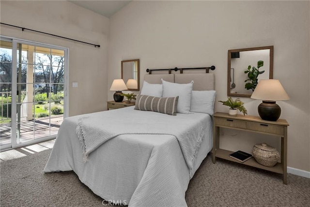 bedroom featuring carpet flooring and access to exterior