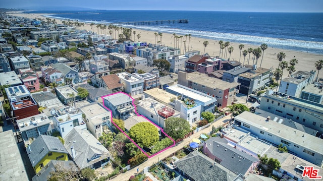 bird's eye view with a view of the beach and a water view