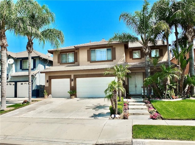 view of front of property with a garage