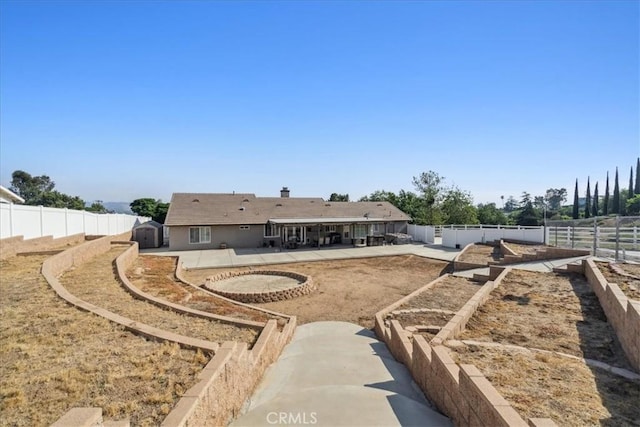 rear view of house with a patio area