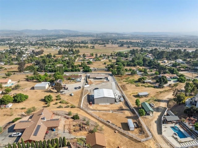 bird's eye view with a mountain view