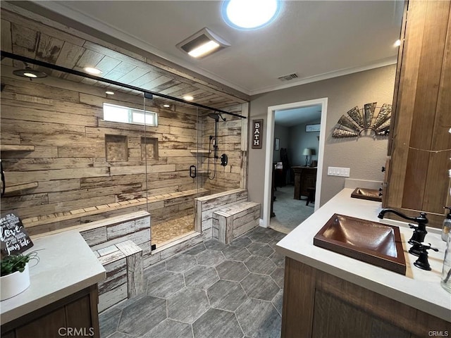 bathroom with vanity and an enclosed shower