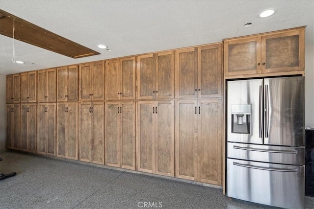 kitchen with stainless steel fridge with ice dispenser