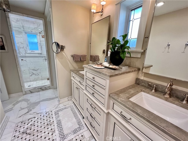 bathroom featuring dual bowl vanity, a tile shower, and tile patterned floors