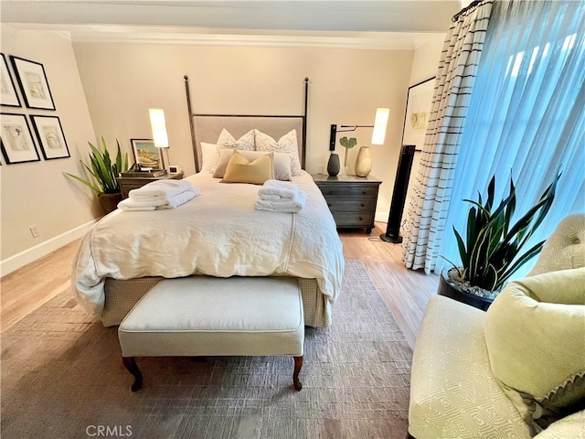 bedroom with light hardwood / wood-style flooring