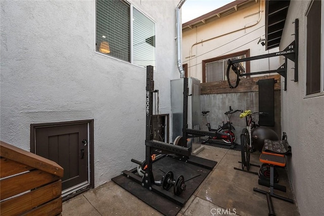 exercise room with a textured wall