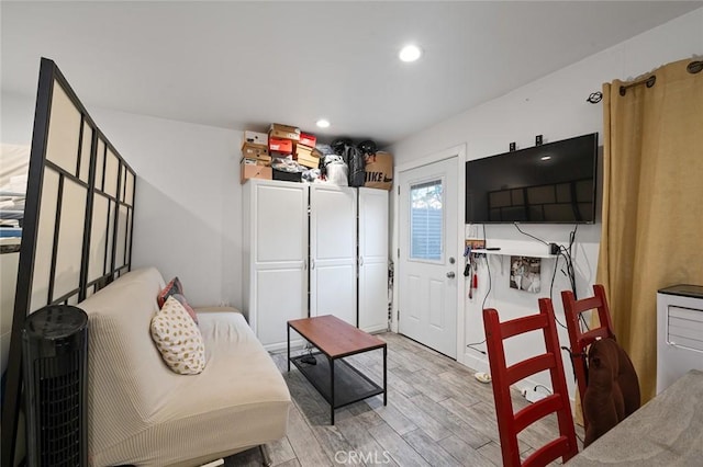 interior space with light wood-style floors and recessed lighting
