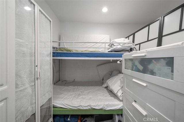 bedroom with recessed lighting