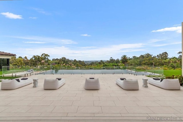 view of patio / terrace with a water view