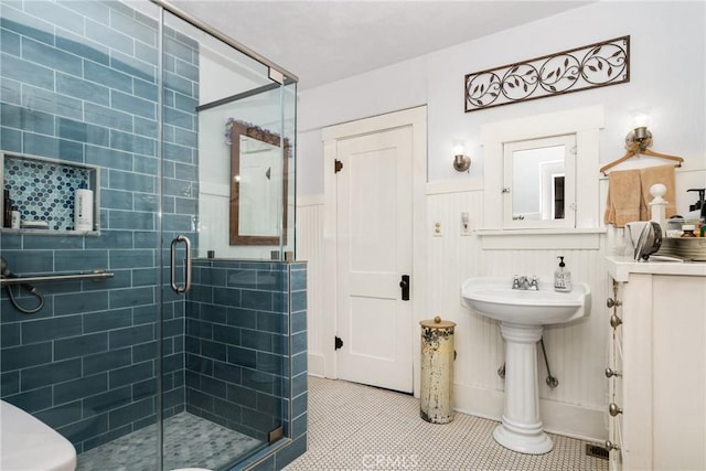 bathroom featuring tile patterned floors and walk in shower