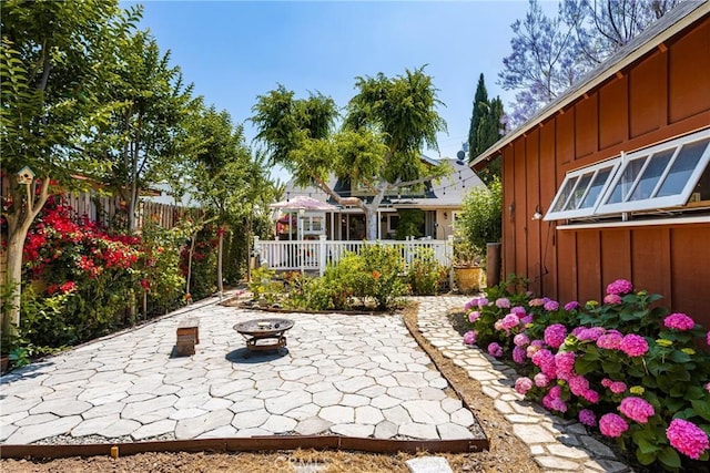 view of patio / terrace featuring a fire pit