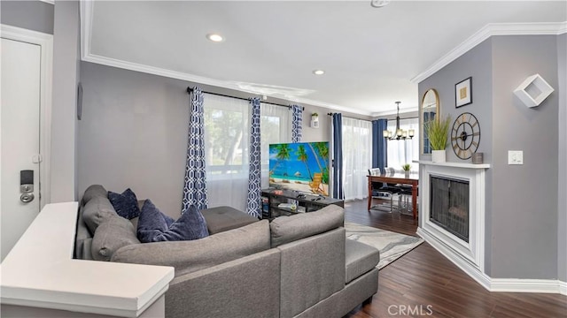 26853 Claudette St Unit 141, Canyon Country, CA 91351 - living area with a chandelier, dark wood-style floors, ornamental molding, and recessed lighting