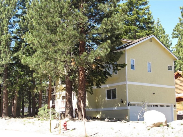 exterior space with a garage