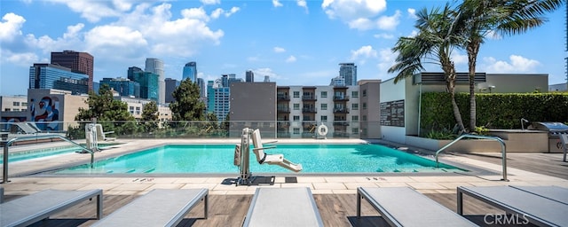 view of pool featuring a patio area