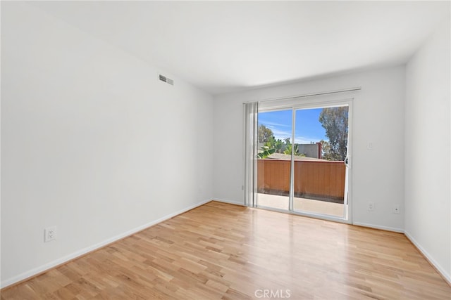 empty room featuring light hardwood / wood-style flooring