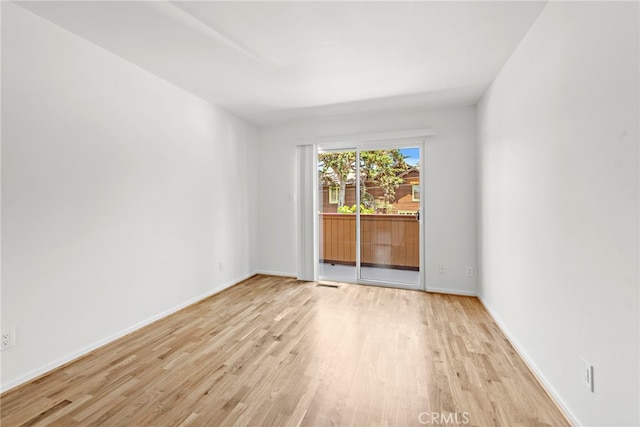 empty room with light wood-type flooring