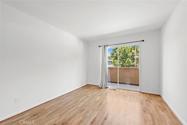 1585 Catalina, Laguna Beach, CA 92651 - empty room featuring light wood-style floors and baseboards