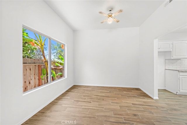 1585 Catalina, Laguna Beach, CA 92651 - unfurnished dining area featuring baseboards, light wood finished floors, and a ceiling fan