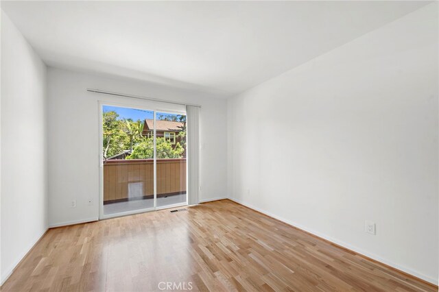 1585 Catalina, Laguna Beach, CA 92651 - empty room with wood finished floors and baseboards