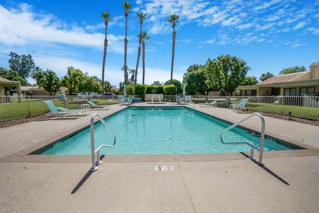 view of swimming pool featuring a patio