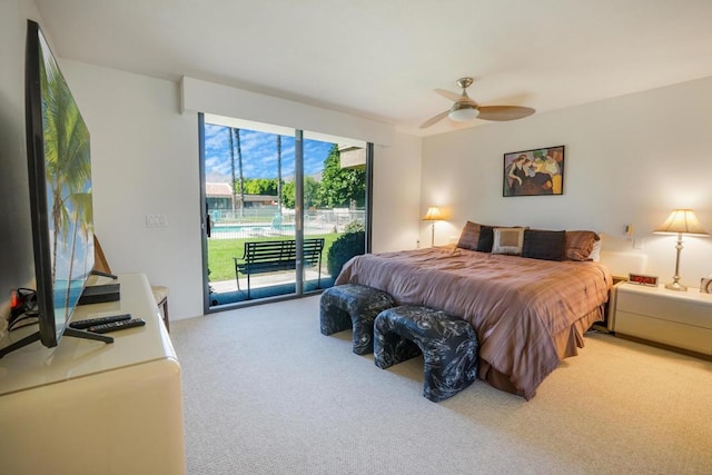 carpeted bedroom featuring ceiling fan and access to exterior