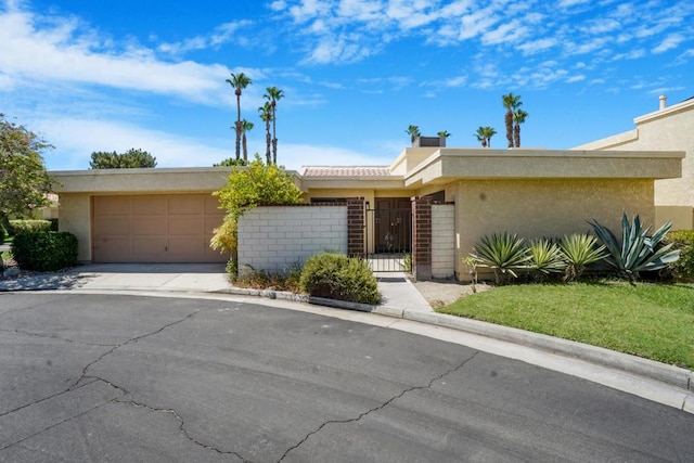 single story home with a garage