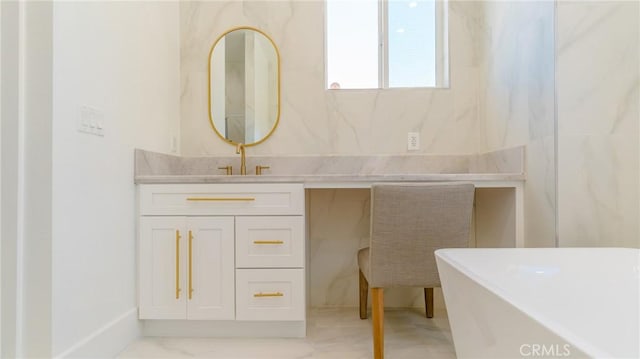 bathroom with a bathtub and vanity