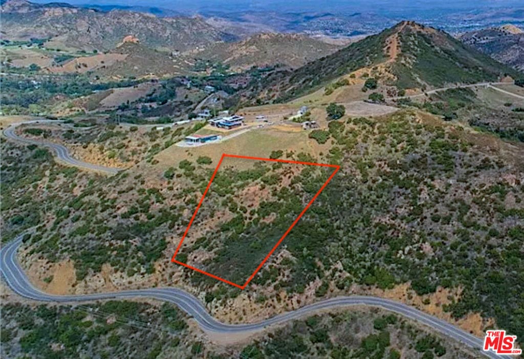 aerial view featuring a mountain view