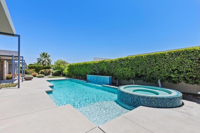 view of pool featuring an in ground hot tub and a patio area