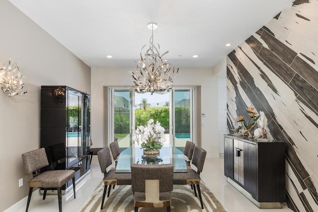 tiled dining area with an inviting chandelier