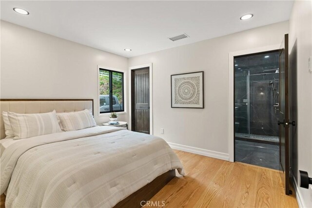 bedroom featuring light wood-type flooring