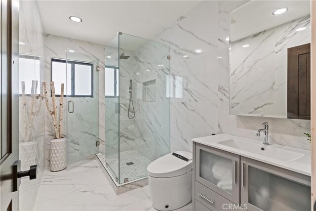 bathroom featuring a shower with shower door, toilet, tile patterned floors, tile walls, and vanity