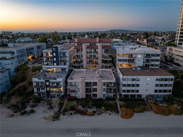 aerial view at dusk with a view of city