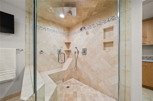 full bathroom with a shower stall