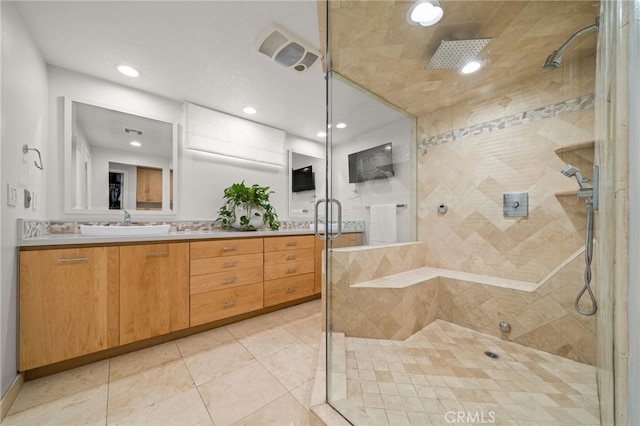 full bathroom featuring tile patterned flooring, recessed lighting, visible vents, vanity, and a stall shower